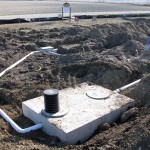 Septic Tank Water flows from Building to Septic Tank to Distribution Box though Headers and to Chambers